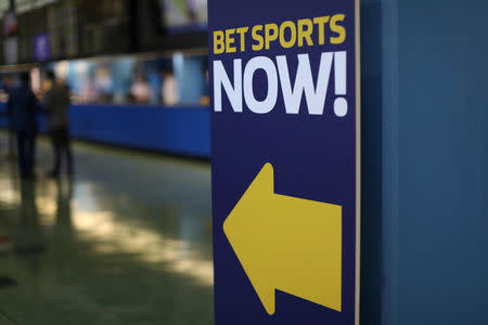 FILE PHOTO: A sign is seen at Monmouth Park Sports Book by William Hill, ahead of the opening of the first day of legal betting on sports in Oceanport, New Jersey, U.S., June 14, 2018. REUTERS/Mike Segar/File Photo