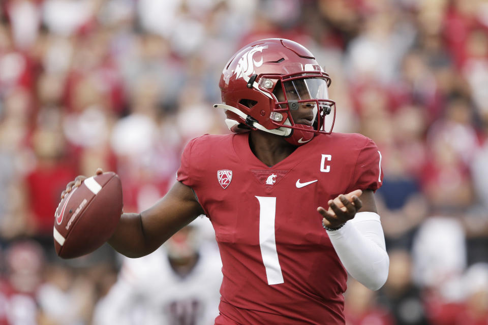 Washington State quarterback Cameron Ward looks for a receiver during the first half of the team's NCAA college football game against Arizona, Saturday, Oct. 14, 2023, in Pullman, Wash. (AP Photo/Young Kwak)