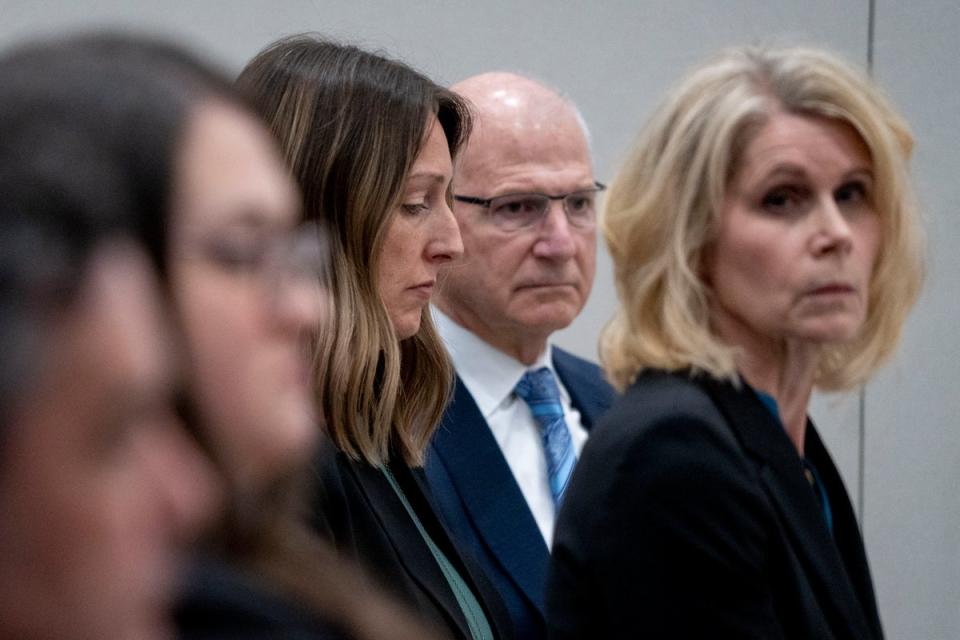 Dr Bernard, centre, appears with her legal team at an Indiana medical board hearing on 25 May. (AP)