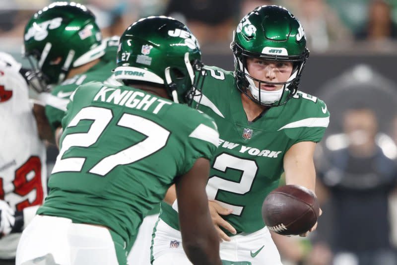 New York Jets quarterback Zach Wilson (R) is in the NFL's concussion protocol. File Photo by John Angelillo/UPI