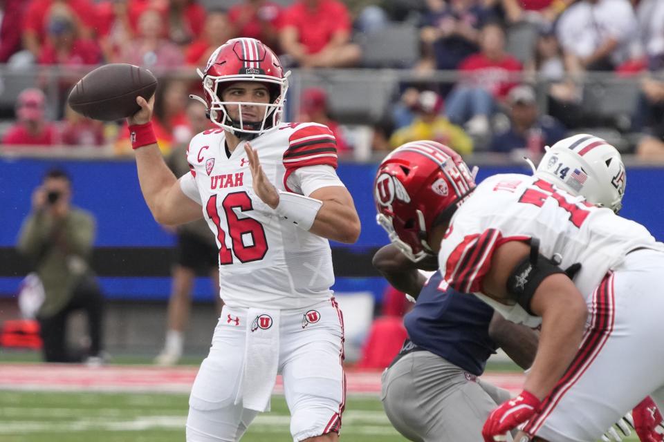 Utah quarterback Bryson Barnes (16) throws the football against Arizona during the first half of an NCAA college football game, Saturday, Nov. 18, 2023, in Tucson, Ariz. | Rick Scuteri, Associated Press