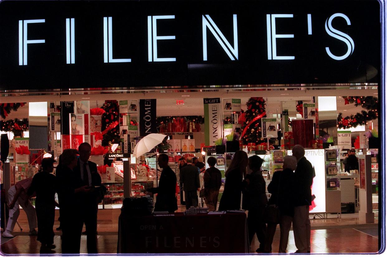 Shoppers check out the new Filene's store in Providence Place mall.