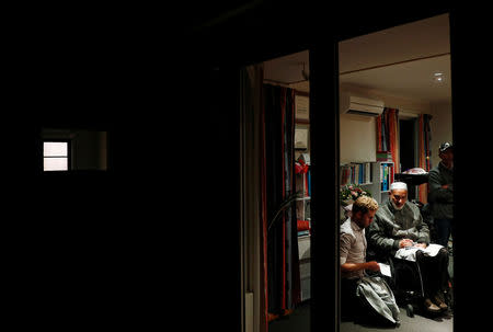 Reuters correspondent Tom Westbrook interviews Farid Ahmed at his home in Christchurch, New Zealand March 18, 2019. REUTERS/Edgar Su