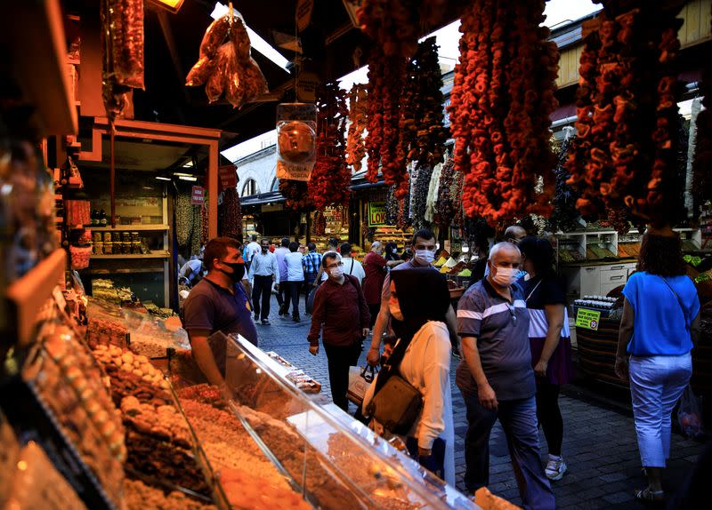 People shop at the Spice Market also known as the Egyptian Bazaar in Istanbul