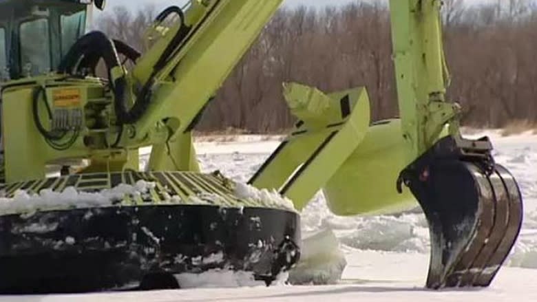 Manitoba sends out Amphibexes to break up ice in preparation for spring