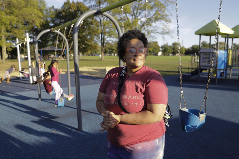 Kathrynne Shaw discusses the impeachment inquiry into President Donald Trump while in a park, Wednesday, Oct. 9, 2019, in Fishers, Ind. (AP Photo/Darron Cummings)