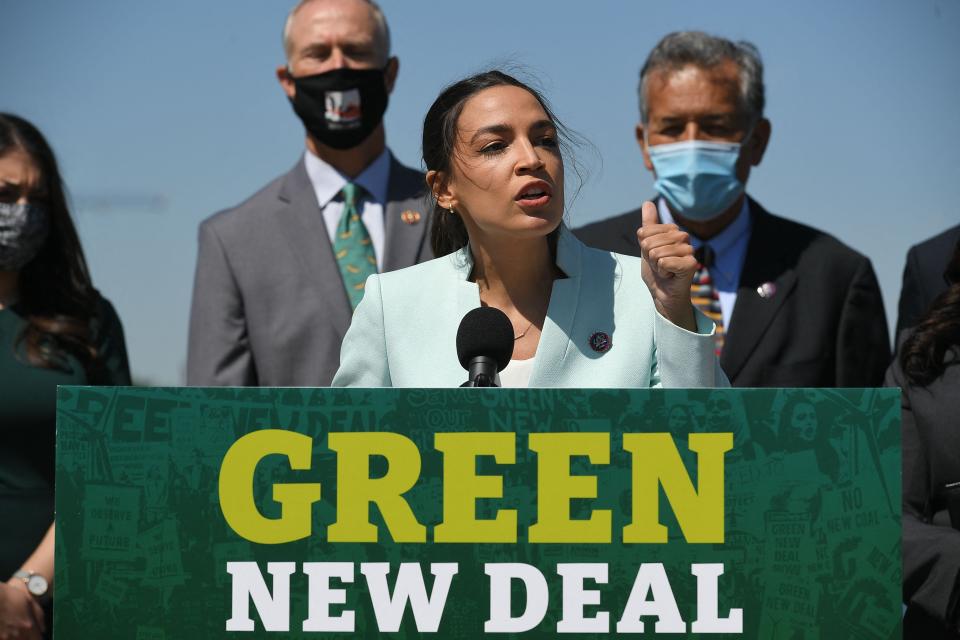 Rep. Alexandria Ocasio-Cortez, D-N.Y., speaks during a press conference to reintroduce the Green New Deal in front of the U.S. Capitol.