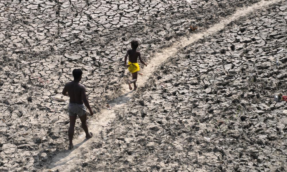 <span>Photograph: Manish Swarup/AP</span>