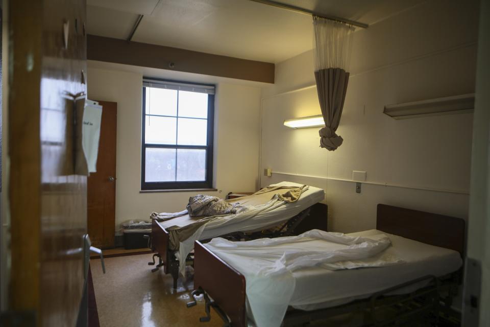 A room is left empty on the fourth floor at Northview Village Nursing Home in St. Louis on Saturday, Dec. 16, 2023. The living facility closed suddenly, much to the outrage of employees, volunteers and relatives of residents who returned to find their belongings and information of the whereabouts of loved ones. (Vanessa Abbitt/St. Louis Post-Dispatch via AP)