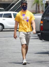 <p>Miles Teller dons a mask and Lakers tee for an errand run in Los Angeles on Thursday.</p>