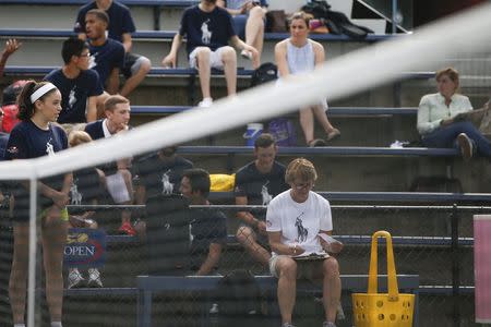 A girl participates in ballpersons tryouts at the USTA Billie Jean King National Tennis Center in the Queens borough of New York June 19, 2014. REUTERS/Shannon Stapleton