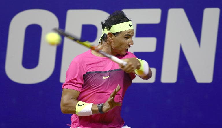 Rafael Nadal of Spain returns the ball to Argentina's Facundo Arguello during their ATP Argentina Open singles match, in Buenos Aires, on February 25, 2015