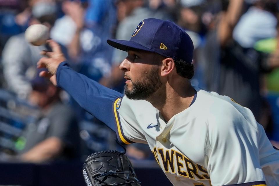 Milwaukee Brewers' Tyson Miller throws during the fourth inning of a spring training baseball game against the Los Angeles Dodgers Saturday, Feb. 25, 2023, in Phoenix. (AP Photo/Morry Gash)