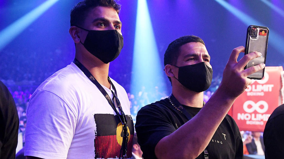 Latrell Mitchell and Cody Walker, pictured here at the Tim Tszyu fight.