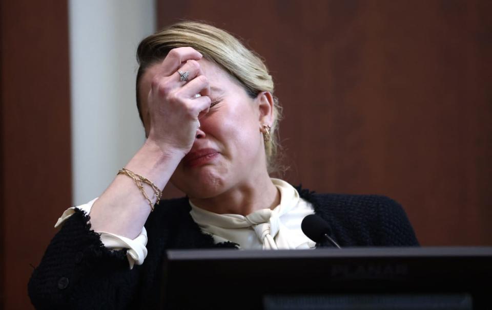 <div class="inline-image__caption"><p>Amber Heard testifies at the Fairfax County Circuit Courthouse in Fairfax, Virginia, on May 5, 2022.</p></div> <div class="inline-image__credit">Jim Lo Scalzo/AFP/Getty</div>