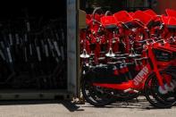 BIRD scooters and JUMP bikes are shown impounded at Scoot Scoop after being removed from private property in San Diego, California