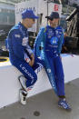 Tony Kanaan, left, of Brazil, talks with Jimmie Johnson during practice for the Indianapolis 500 auto race at Indianapolis Motor Speedway, Tuesday, May 17, 2022, in Indianapolis. (AP Photo/Jenna Fryer)