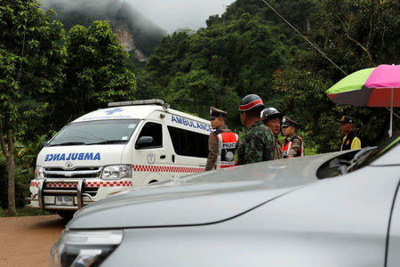 An ambulance leaves the site of the Tham Luang cave complex after members of the media were instructed to move out urgently, in the northern province of Chiang Rai, Thailand, July 8, 2018. REUTERS/Tyrone Siu