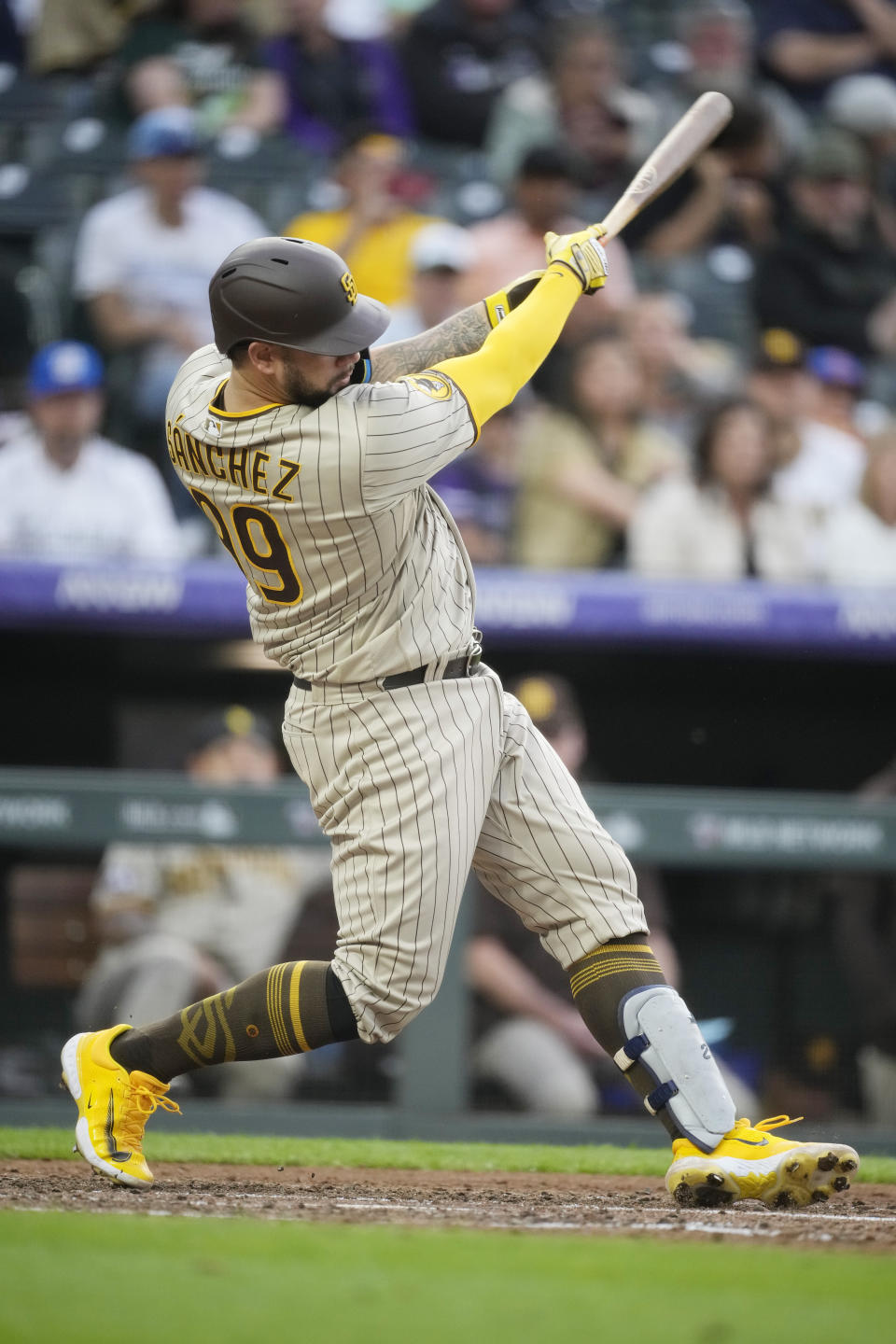 San Diego Padres' Gary Sanchez grounds out against Colorado Rockies starting pitcher Austin Gomber in the fourth inning of a baseball game Friday, June 9, 2023, in Denver. (AP Photo/David Zalubowski)