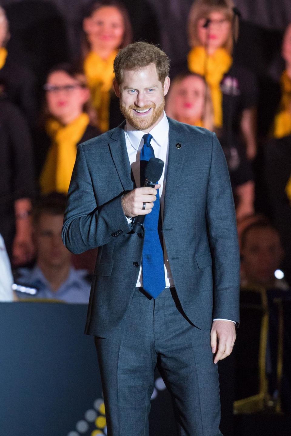 Prince Harry speaks onstage at the opening of the competition (PA)