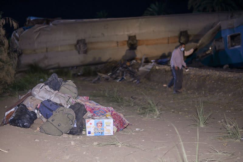 Belongings are seen near the site where two trains have collided near the city of Sohag