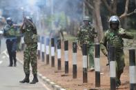 In Nairobi, police fired tear gas to disperse groups of demonstrators who tried to march through the city