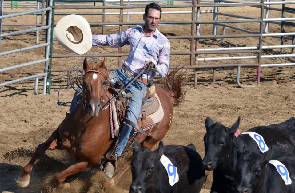 Dave Skinner of Stockton used a Nikon D7000 DSLR camera to photograph a cowboy competing in the penning competition at the Amador County Fair in Plymouth.