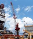 Cranes used to lift and move heavy drilling equipment are pictured on BP's Thunder Horse Oil Platform in the Gulf of Mexico, 150 miles from the Louisiana coast, May 11, 2017. Picture taken May 11, 2017. REUTERS/Jessica Resnick-Ault