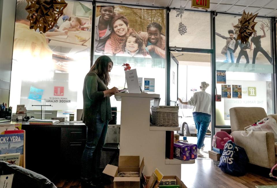 Melanie Borges works the counter at Foster Forward's Community Storefront, which is owned and subsidized by Ocean State Job Lot.