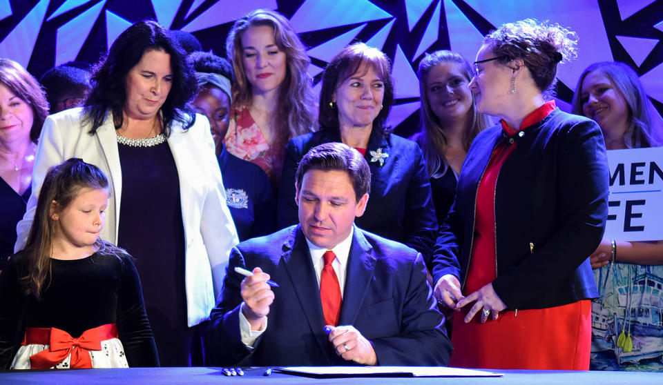 Governor Ron DeSantis signs Florida's 15-week abortion ban into law at Nacion de Fe church in Kissimmee, on April 14, 2022. (Paul Hennessy / SOPA Images/LightRocket via Getty Images file)