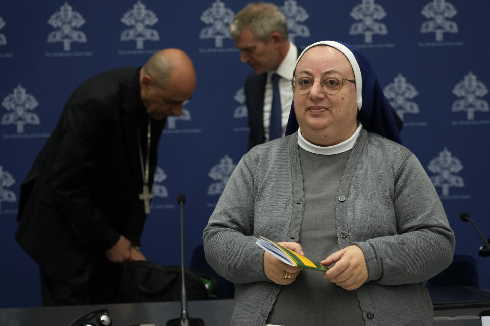 Sister Daniela del Gaudio, head of he Observatory on Marian Apparitions and Mystical Phenomenon, leaves at the end of a press conference at the Vatican, Friday, May 17, 2024. The Vatican on Friday radically reformed its process for evaluating alleged visions of the Virgin Mary, weeping statues and other seemingly supernatural phenomena that have long punctuated church history, putting the brakes on making definitive declarations unless the event is obviously fabricated. (AP Photo/Alessandra Tarantino)