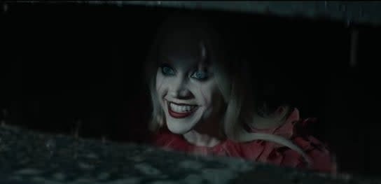 Kate McKinnon as Kellywise the Dancing Clown in a storm drain in "Saturday Night Live"