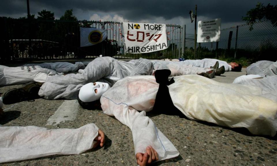 Activists protest in front of Kleine-Brogel military base near Peer in Belgium. 