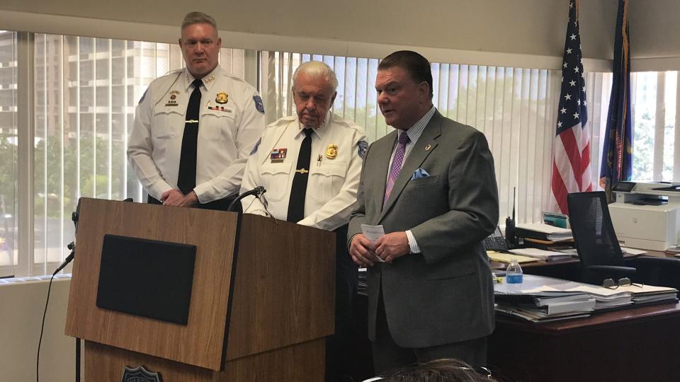 Warren Police Deputy Commissioner William Reichling, left, Police Commissioner Bill Dwyer, center, and Macomb County Prosecutor Peter Lucido at a news conference June 20, 2023 in Dwyer's office about a Warren police officer charged with assault in the city jail fingerprinting area June 13, 2023.