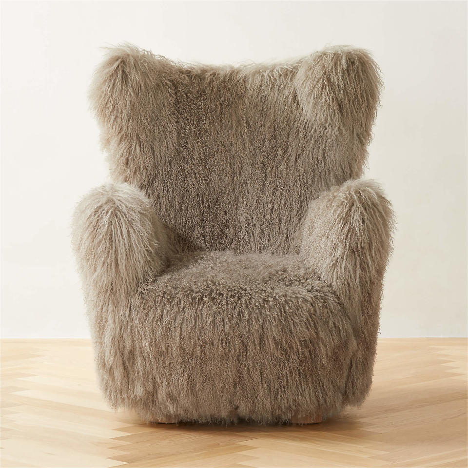 <p><a href="https://go.redirectingat.com?id=74968X1596630&url=https%3A%2F%2Fwww.cb2.com%2Fbozzi-taupe-mongolian-sheepskin-accent-chair%2Fs633735&sref=https%3A%2F%2Fwww.elledecor.com%2Fshopping%2Ffurniture%2Fg35163937%2Fsoft-cozy-chairs%2F" rel="nofollow noopener" target="_blank" data-ylk="slk:Shop Now;elm:context_link;itc:0;sec:content-canvas" class="link ">Shop Now</a></p><p>Bozzi Sheepskin Accent Chair</p><p>cb2.com</p><p>$2999.00</p><span class="copyright">Courtesy of CB2</span>