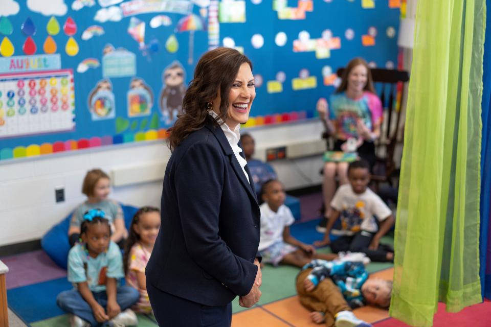 Michigan Gov. Gretchen Whitmer laughs at a student's comment while visiting a first grade classroom at Forest Park Elementary in Eastpointe on Monday, Aug. 28, 2023.