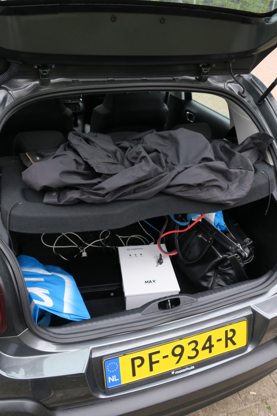 In this image released by the Dutch Defense Ministry on Thursday Oct. 4, 2018, the boot of a car filled with hacking equipment belonging to four Russian officers of the Main Directorate of the General Staff of the Armed Forces of the Russian Federation, GRU, is seen on April 13, 2018. The officers were expelled from the Netherlands for allegedly trying to hack into the U.N. chemical watchdog OPCW's network. The Dutch defense minister on Thursday Oct. 4, 2018, accused Russia's military intelligence unit of attempted cybercrimes targeting the U.N. chemical weapons watchdog and the investigation into the 2014 Malaysian Airlines crash over Ukraine. (Dutch Defense Ministry via AP)