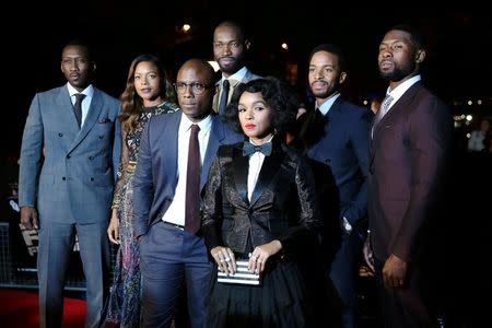 Cast members pose as they arrive for the gala screening of the film "Moonlight" on the second night of the 60th British Film Institute (BFI) London Film Festival at Embankment Garden Cinema in London, Britain October 6, 2016. REUTERS/Neil Hall/File Photo