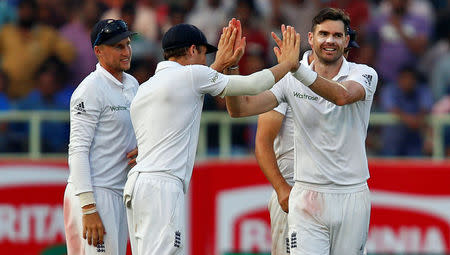 Cricket - India v England - Second Test cricket match - Dr. Y.S. Rajasekhara Reddy ACA-VDCA Cricket Stadium, Visakhapatnam, India - 17/11/16. England's James Anderson (R) celebrates with team mates after taking the wicket of India's Ajinkya Rahane. REUTERS/Danish Siddiqui