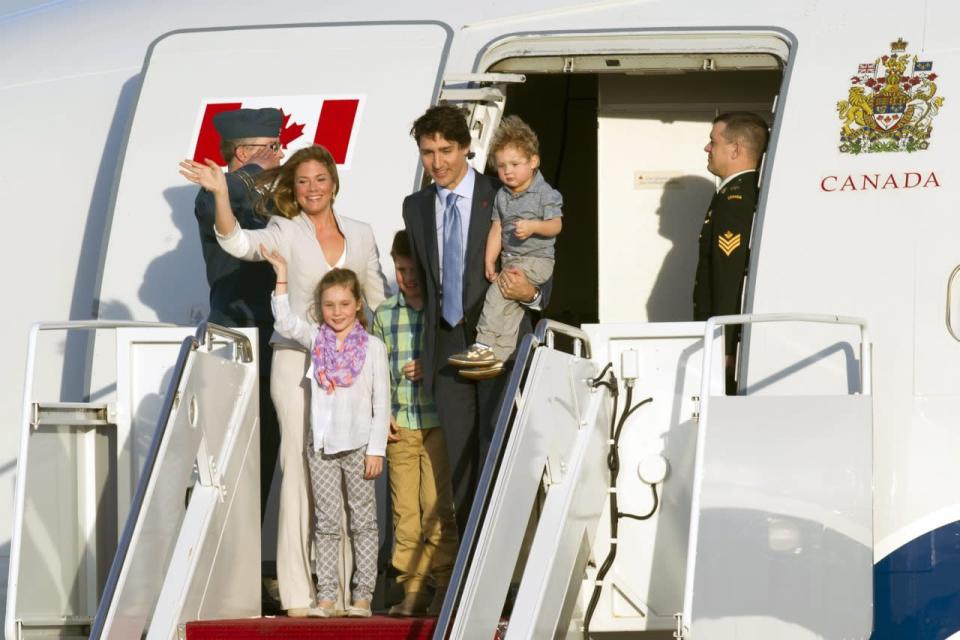 Canadian Prime Minister Justin Trudeau and his wife Sophie Grégoire-Trudeau, and their children, arrive at Andrews Air Force Base, Md., Wednesday, March 9, 2016. AP Photo/Cliff Owen