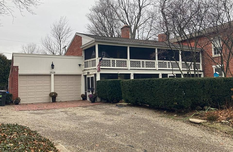 Pictured is the driveway, two-car garage and back deck of the Wallace-Knox house, located at 3528 Sassafras St., now for sale.