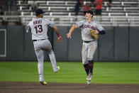 Cleveland Guardians shortstop Gabriel Arias (13) celebrates with right fielder Will Brennan after the team's win ovr the Minnesota Twins in a baseball game Tuesday, Aug. 29, 2023, in Minneapolis. (AP Photo/Craig Lassig)