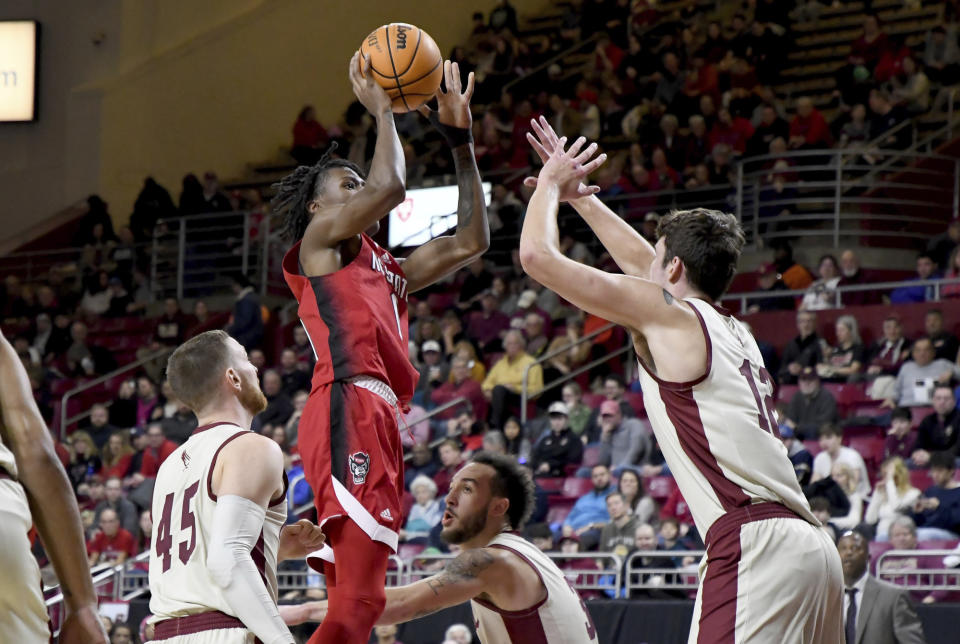 North Carolina State's Jarkel Joiner (1) shoots over Boston College's Quinten Post (12) during the first half of an NCAA college basketball game, Saturday, Feb. 11, 2023, in Boston. (AP Photo/Mark Stockwell)
