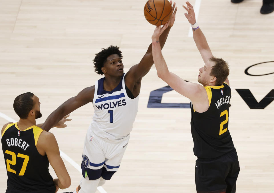 Anthony Edwards tries to block Joe Ingles shot