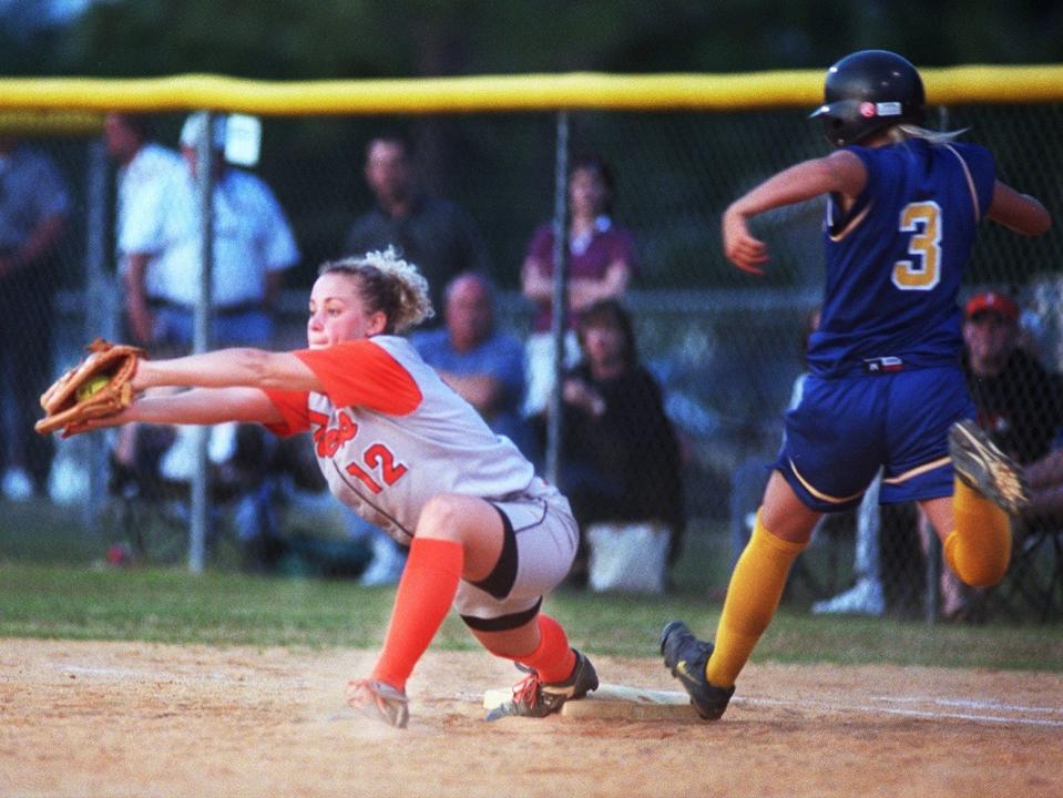 South View's Jennifer Bonilla gets Katie Spencer out on first base at South View High School Friday, May 24, 2002.