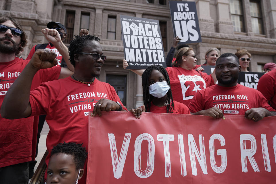 A group joins a rally to support voter rights on the steps of the Texas Capitol, Thursday, July 8, 2021, in Austin, Texas. The Texas Legislature began a special session Thursday. (AP Photo/Eric Gay)