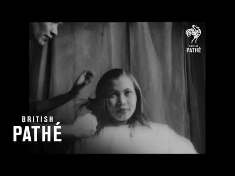 <p>Watch as a narrator explains how black hair was chemically straightened back in the day—with some snarky comments along the way.</p><p><strong>The good:</strong> It's pretty cool to see how this process was done in the past. The chemical straightening took two hours and involved a "secret" blend of oils and hot combs. </p><p><strong>The bad: </strong>I could really go without the narrators commentary on how most women want curly hair, but black women want to change their natural texture. "Do they like it? They're women, aren't they?"<span> he quips. Not cool, dude.</span></p>
