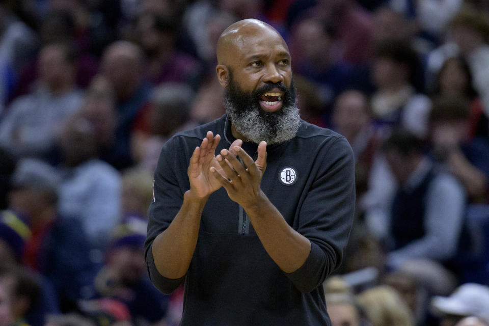 Brooklyn Nets coach Jacque Vaughn applauds the first half of the team's NBA basketball game against the New Orleans Pelicans in New Orleans, Friday, Jan. 6, 2023. (AP Photo/Matthew Hinton)