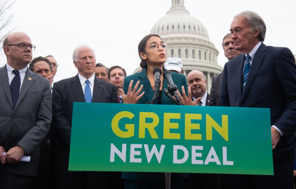Democratic Rep. Alexandria Ocasio-Cortez of New York and Sen. Ed Markey of Massachusetts, right, announce the Green New Deal legislation on Feb. 7, 2019.