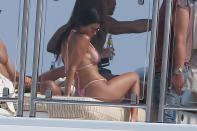 Kourtney strips down to a G-string on Cannes holiday